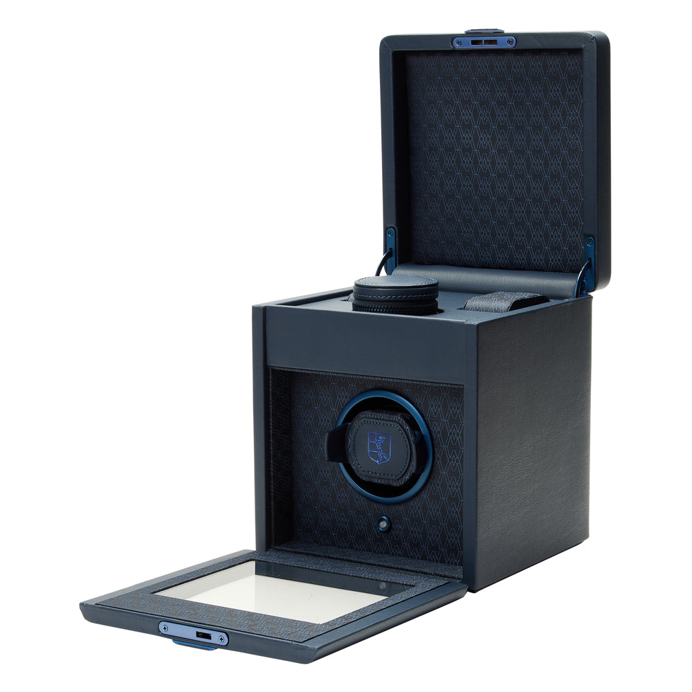 Blue watch winder with open lid on a white background