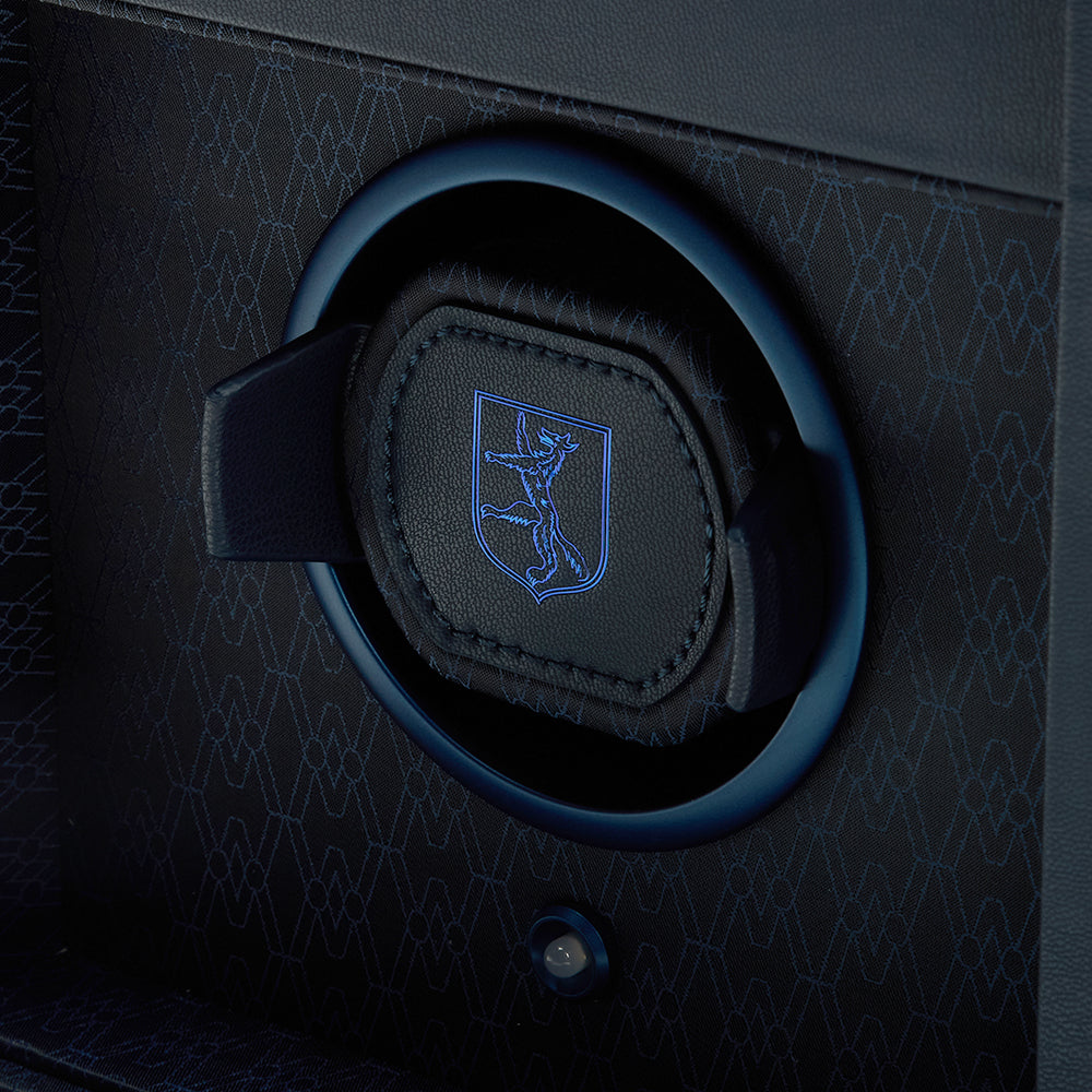 Close-up of a blue watch winder with wolf 1834 branding