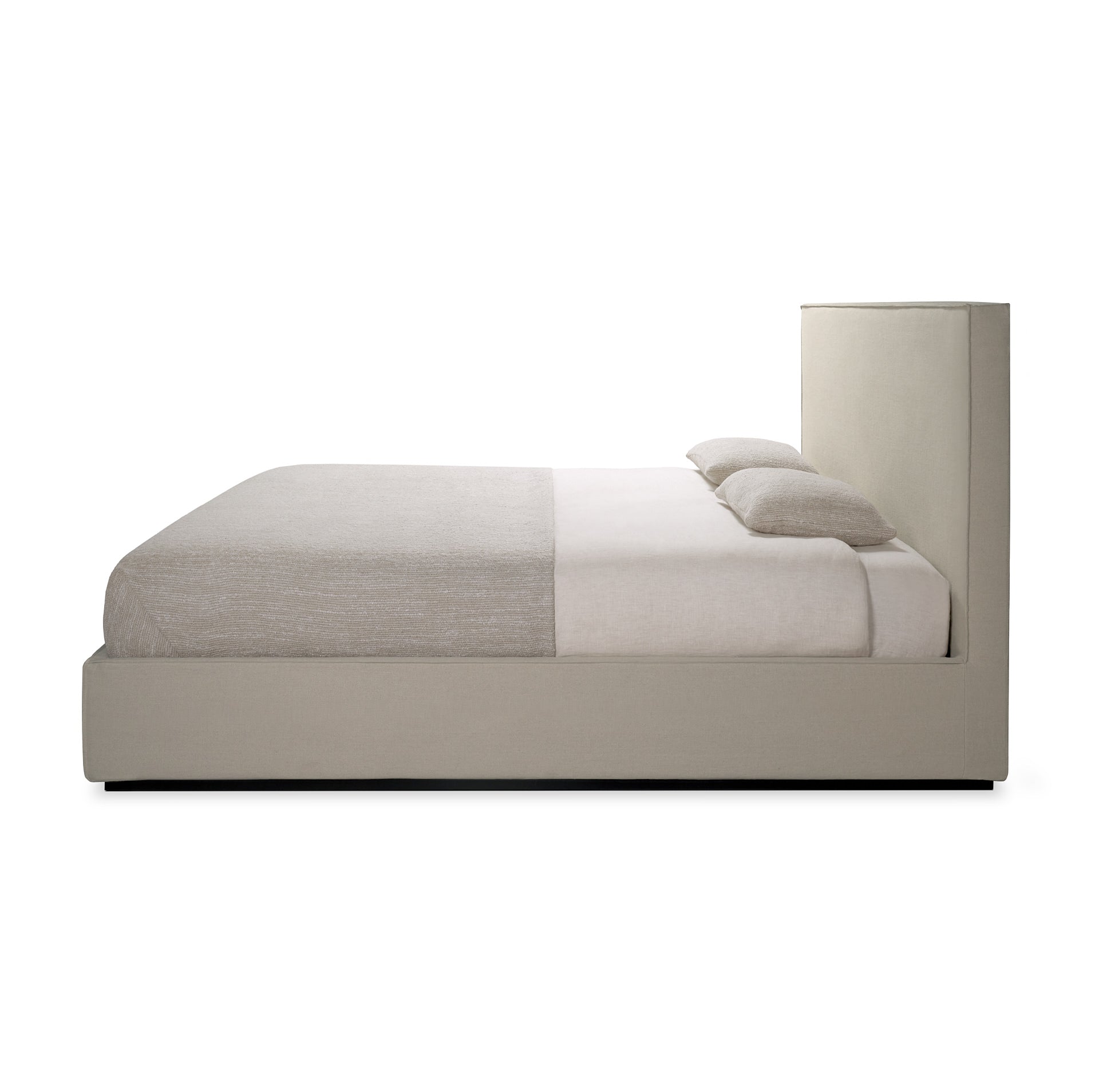 Beige bed with white bedding on a white background