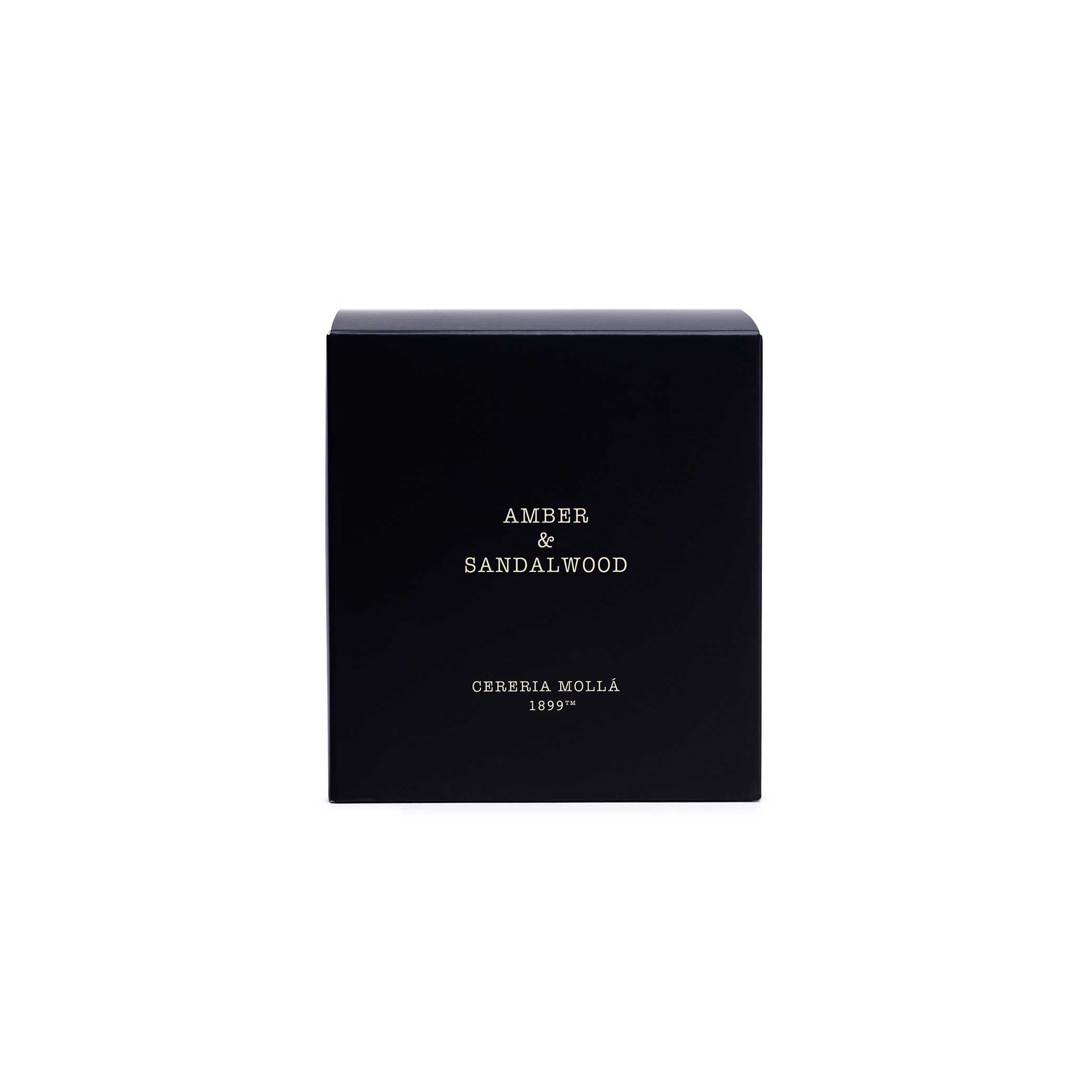 A black rectangular box with gold lettering that reads 'AMBER & SANDALWOOD' and 'CEREBIA MOLLÉA 1899', centered on a plain white background.