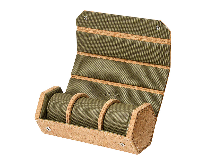 Green and cork wolf watch holder on a white background