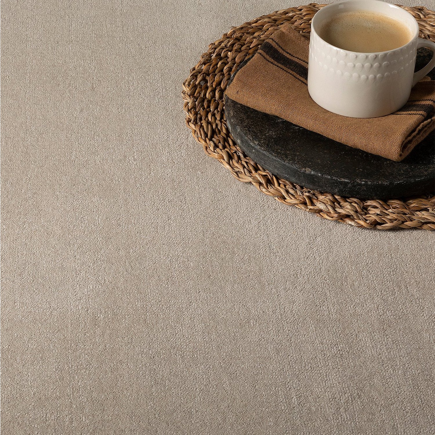 Soft beige carpet with a plush, textured finish—luxury flooring supplied and fitted by Iroka Interiors in Cornwall.