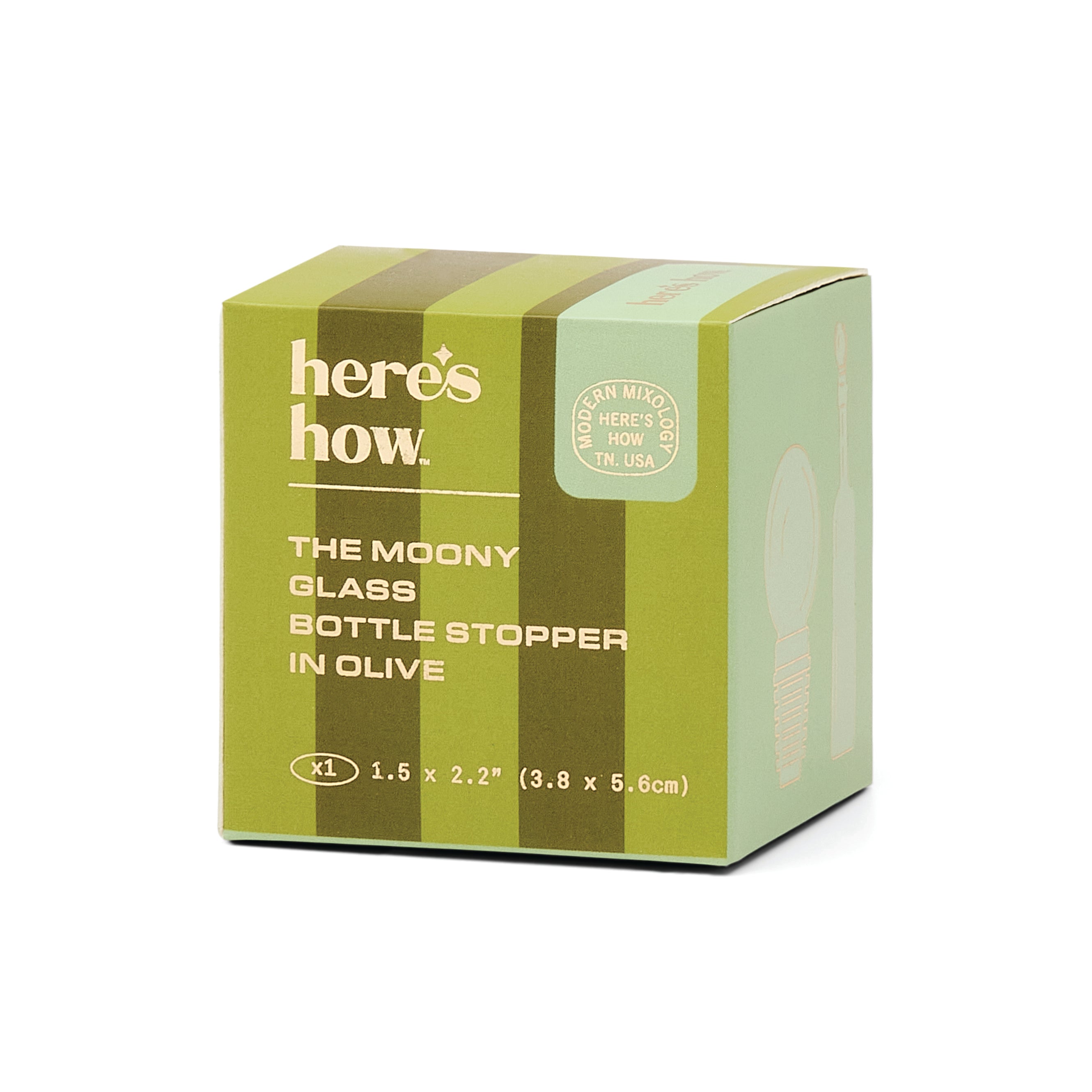 A green and olive-green cardboard box for the Here's How Moony Glass Bottle Stopper, shown on a plain white background.