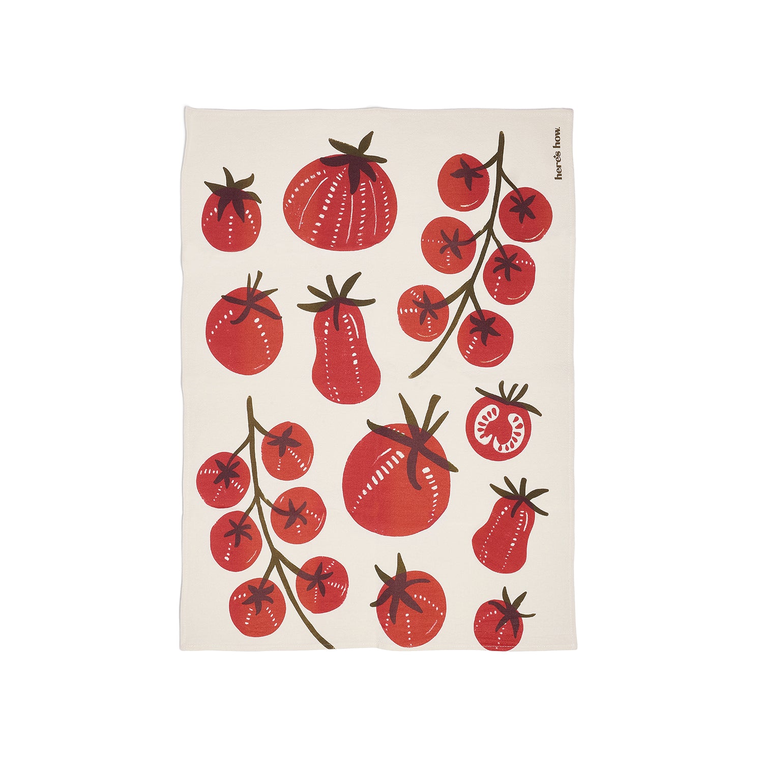 Tea towel with red tomato design on a white background