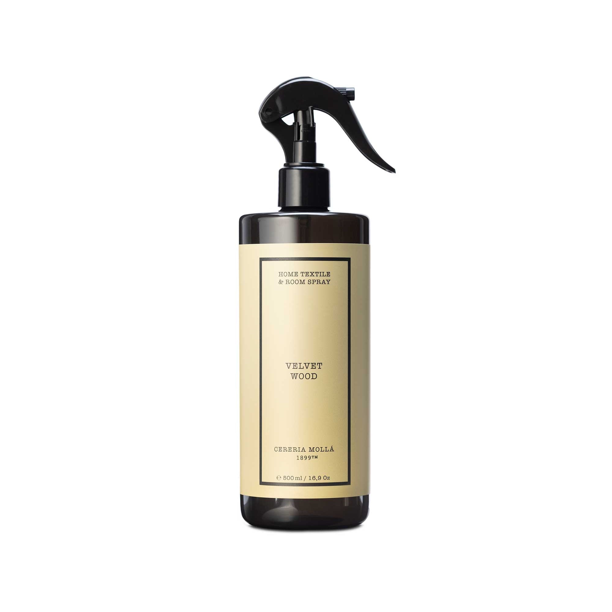 Spray bottle with a gold label on a white background