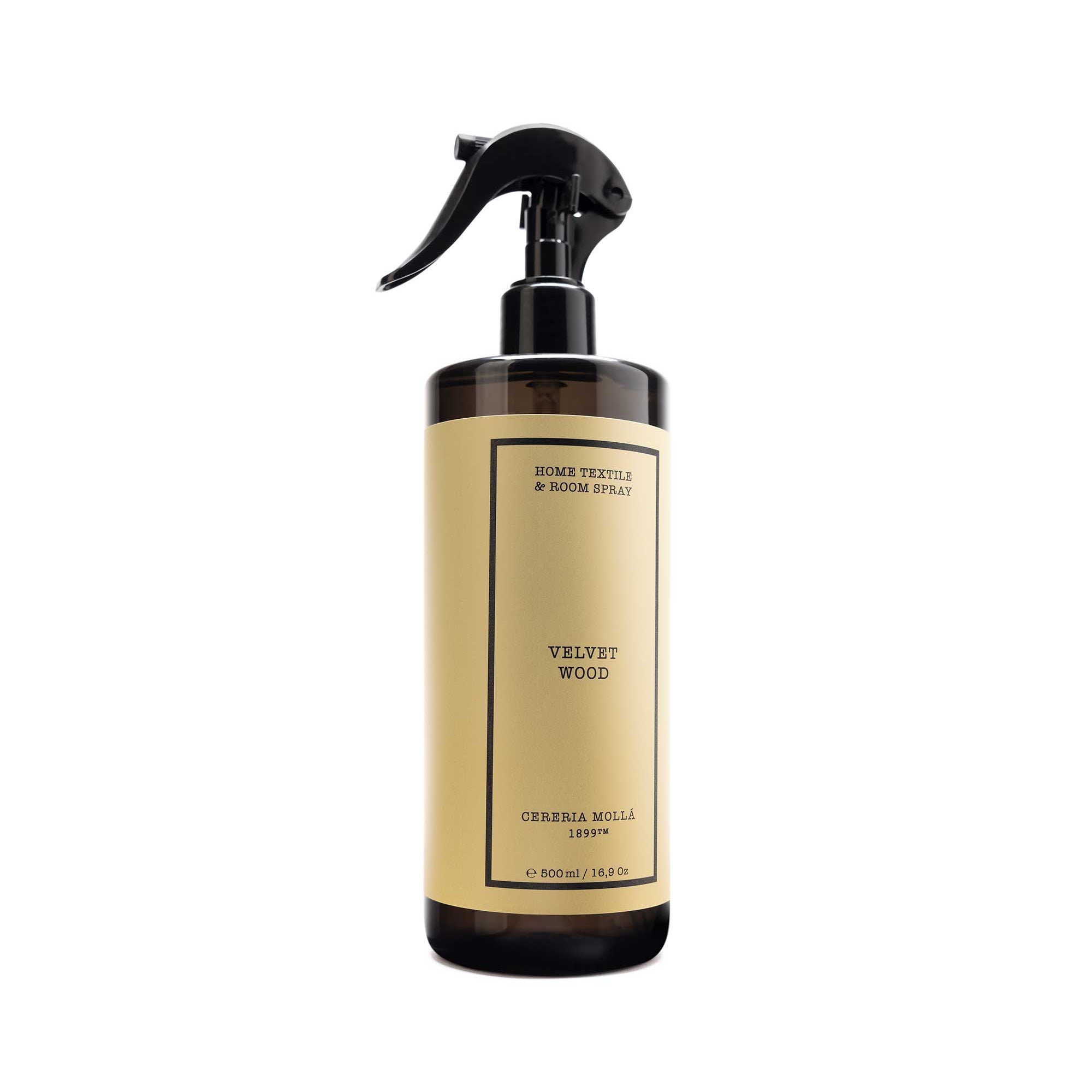 A bottle of cereria molla Velvet Wood Room Spray with a black trigger sprayer and a beige label, shown on a plain white background.