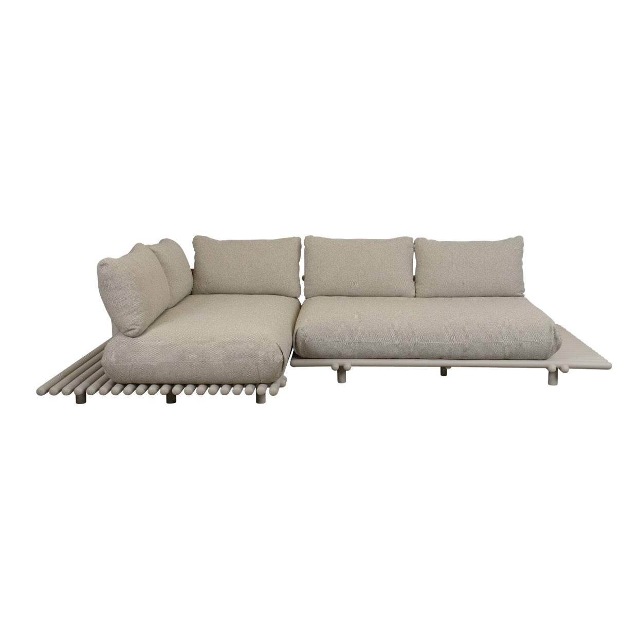 A modern outdoor sectional sofa in a light beige fabric, featuring a left-facing chaise lounge with a slatted base and three matching back cushions, shown against a plain white background.