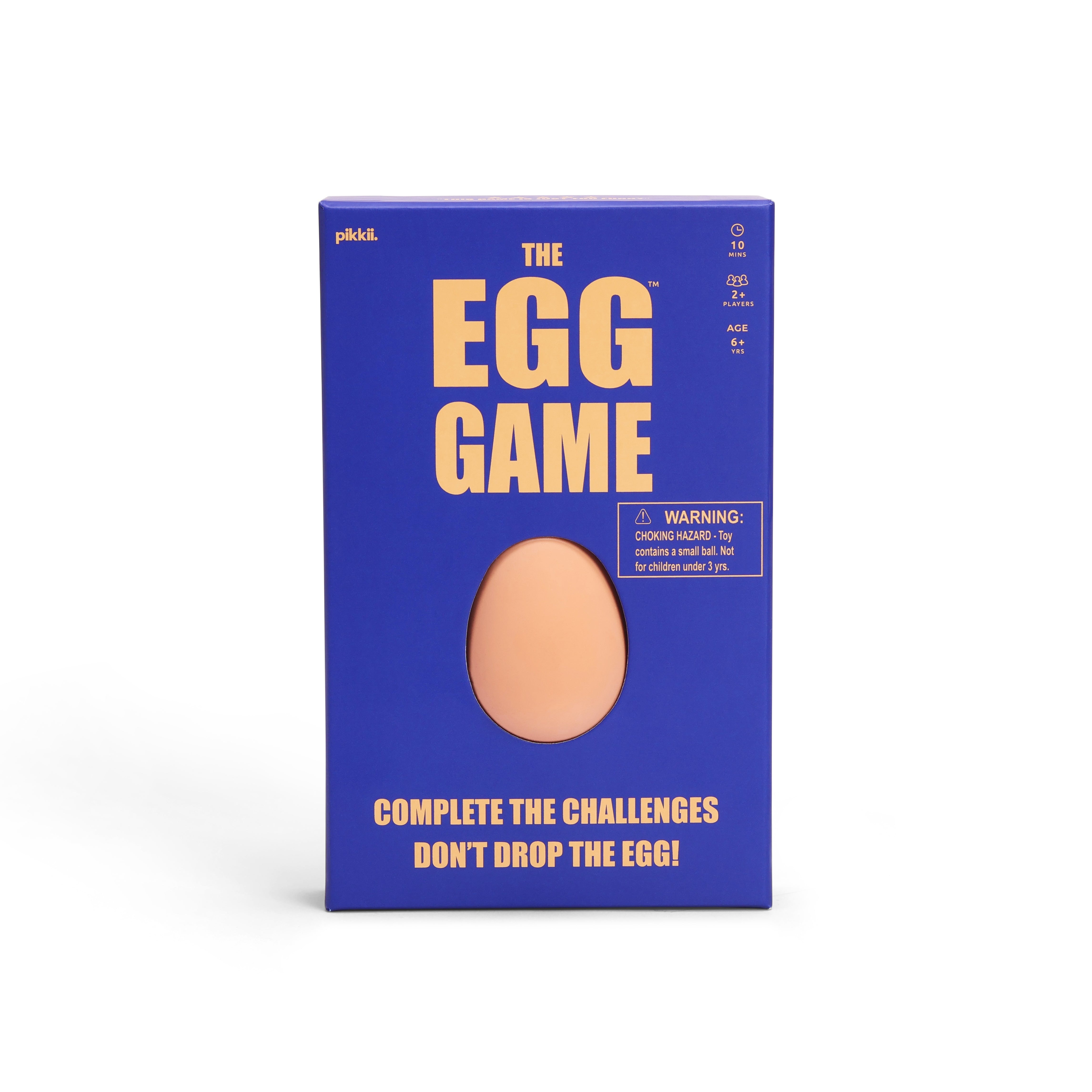 The Egg Game board game, featuring a vibrant blue background with bold yellow text and a realistic peach-colored egg cutout in the center.