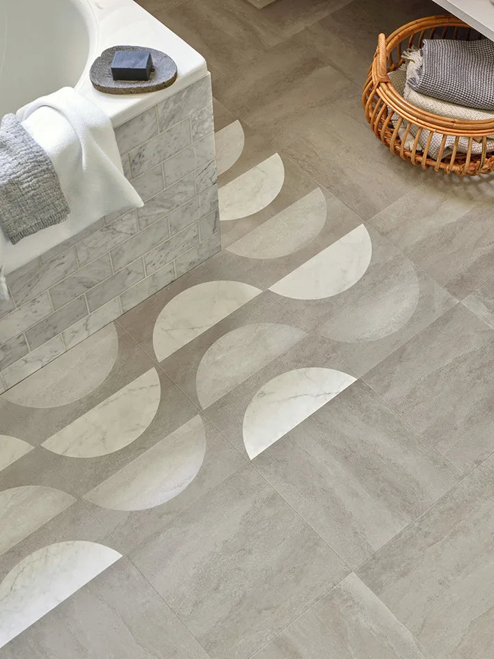 Contemporary bathroom with geometric Amtico flooring in grey and white arc design – luxury vinyl tiles combining style and durability for modern interiors.