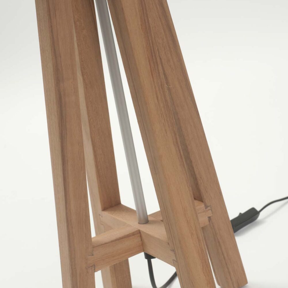 Close-up of a wooden tripod-style lamp base with a silver vertical rod and visible power cord on a white background.