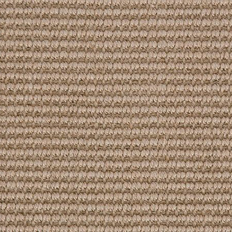 Close-up of Jutex Natural jute carpet swatch featuring a fine, tightly woven ribbed texture in a warm, natural beige tone – perfect for eco-conscious, rustic interiors.
