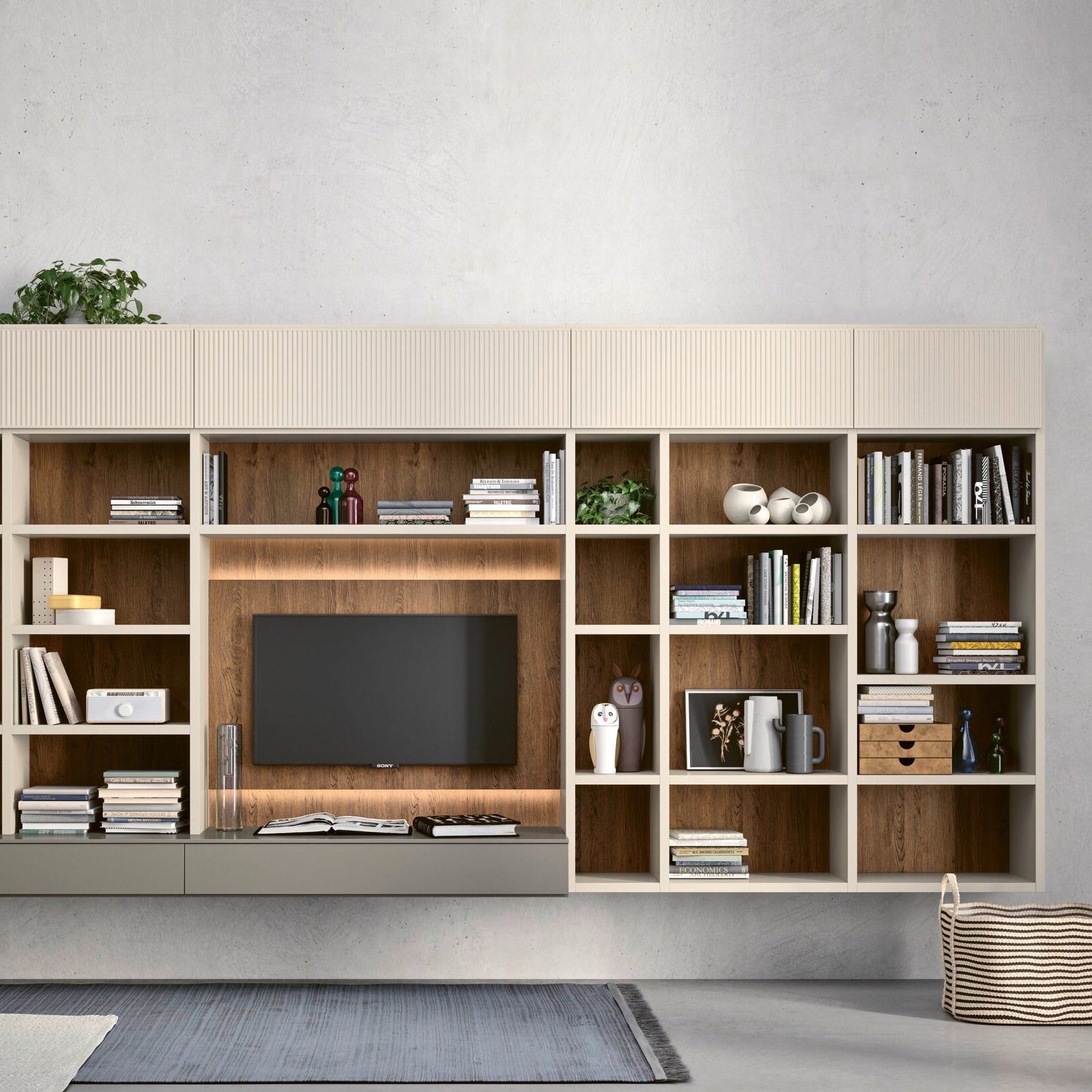 Contemporary wall-mounted shelving and media unit in a minimalist living room, featuring light oak cabinetry and integrated TV space – bespoke fitted furniture solution, for modern home storage and display.