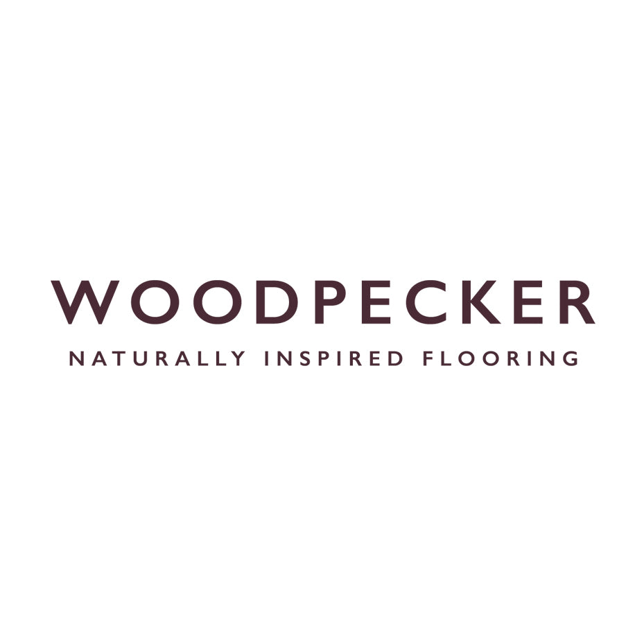 Woodpecker Flooring logo – naturally inspired wood and engineered flooring brand available through Iroka Interiors in Cornwall.