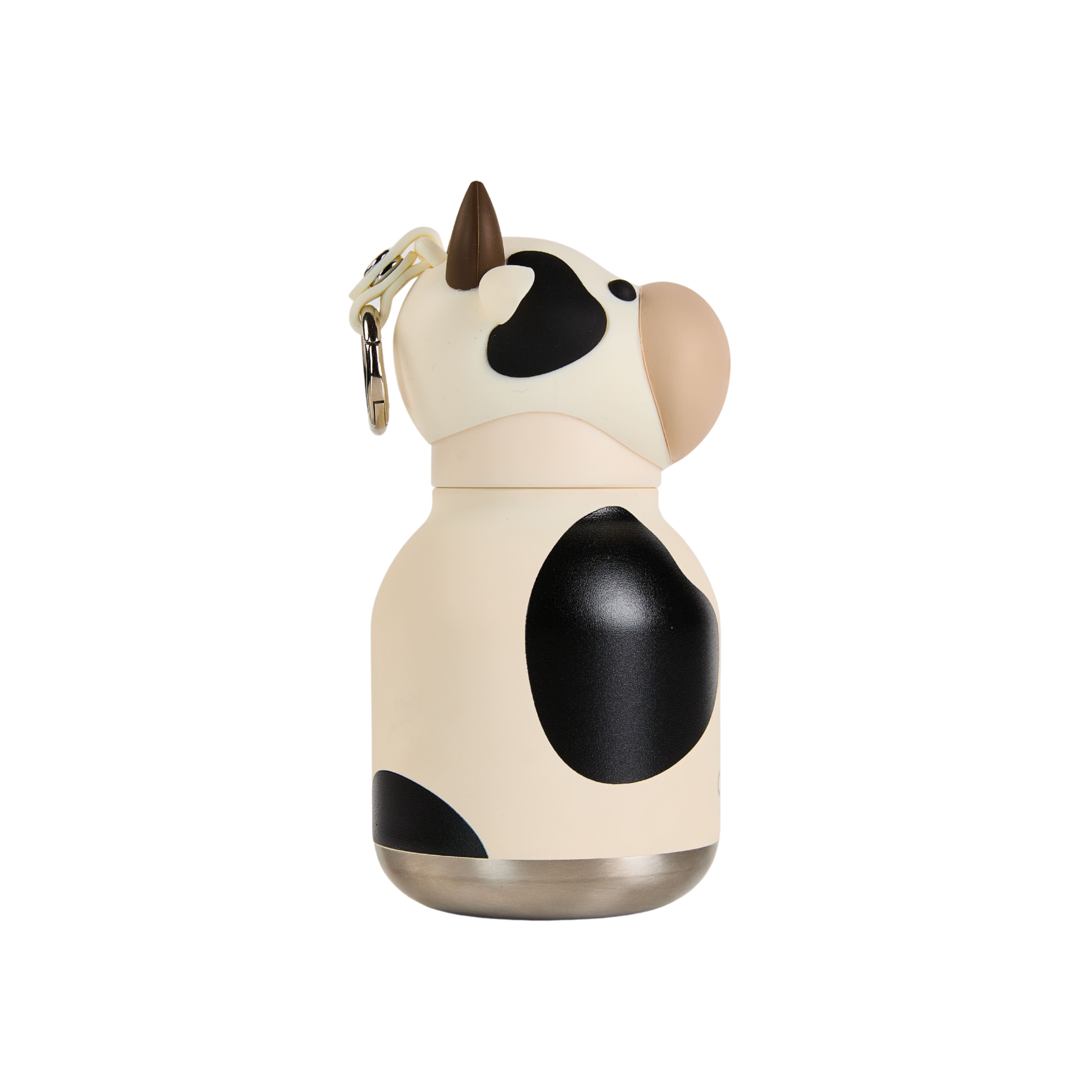 A cow-shaped insulated water bottle with a cream and black spotted pattern, a brown horn, and a silver metal keychain attached, shown on a plain white background.