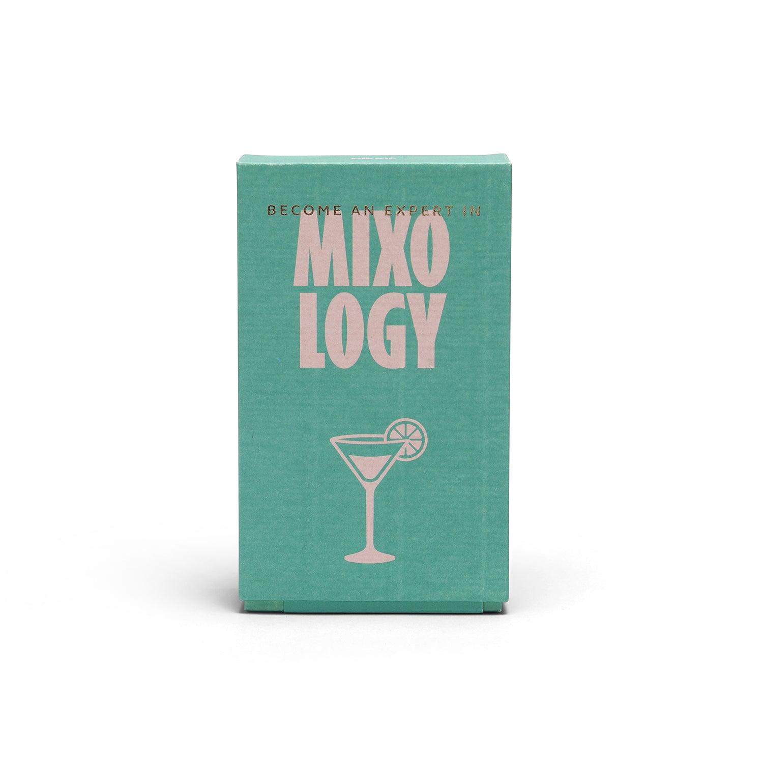 A mint green rectangular book or card deck box standing upright on a white background. The front features the title 'MIXOLOGY' in large pale pink letters, with smaller text above reading 'BECOME AN EXPERT IN' and a simple martini glass illustration below.