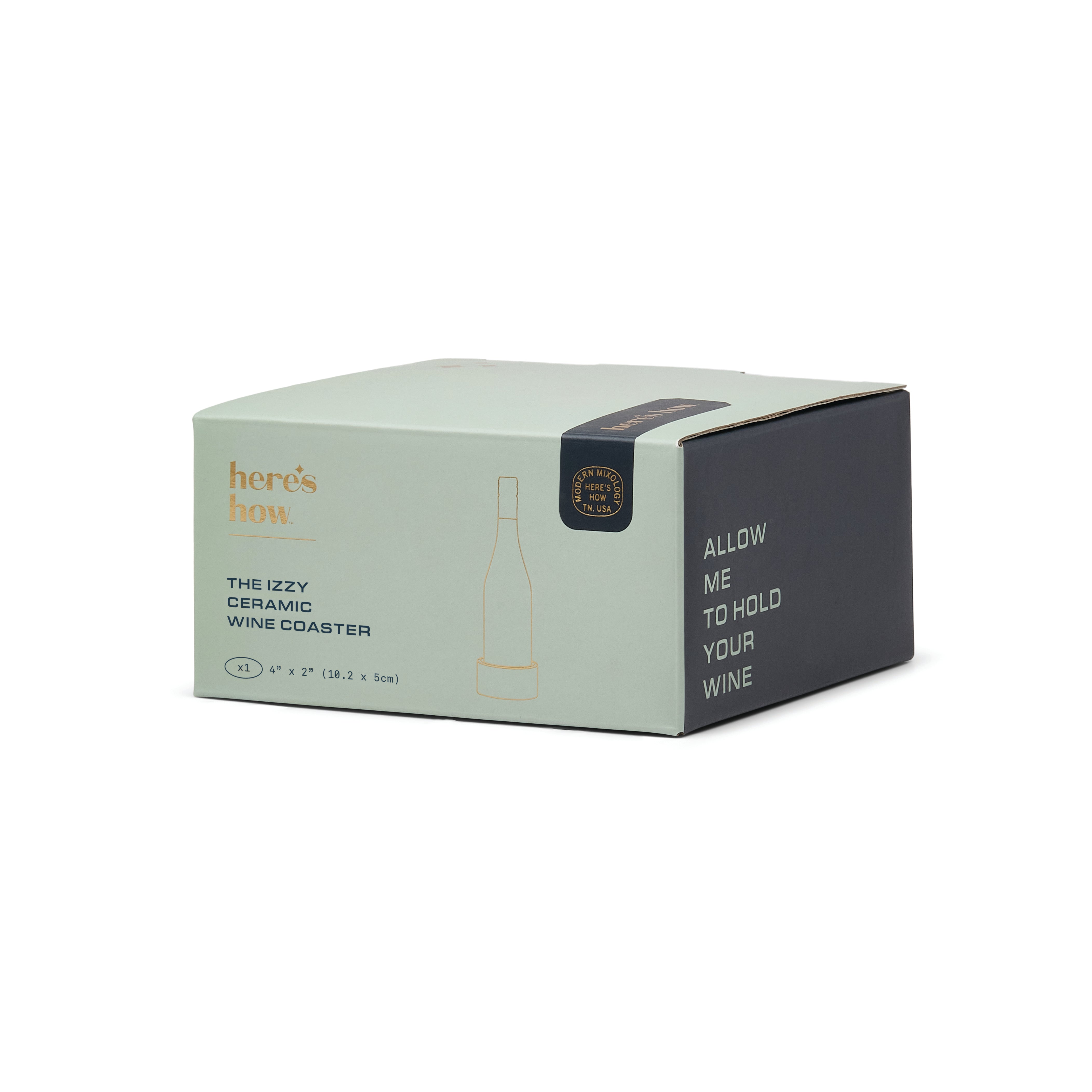 The Izzzy Ceramic Wine Coaster by Here's How, shown in its original packaging box. The box is sage green and dark charcoal gray with gold and white text.