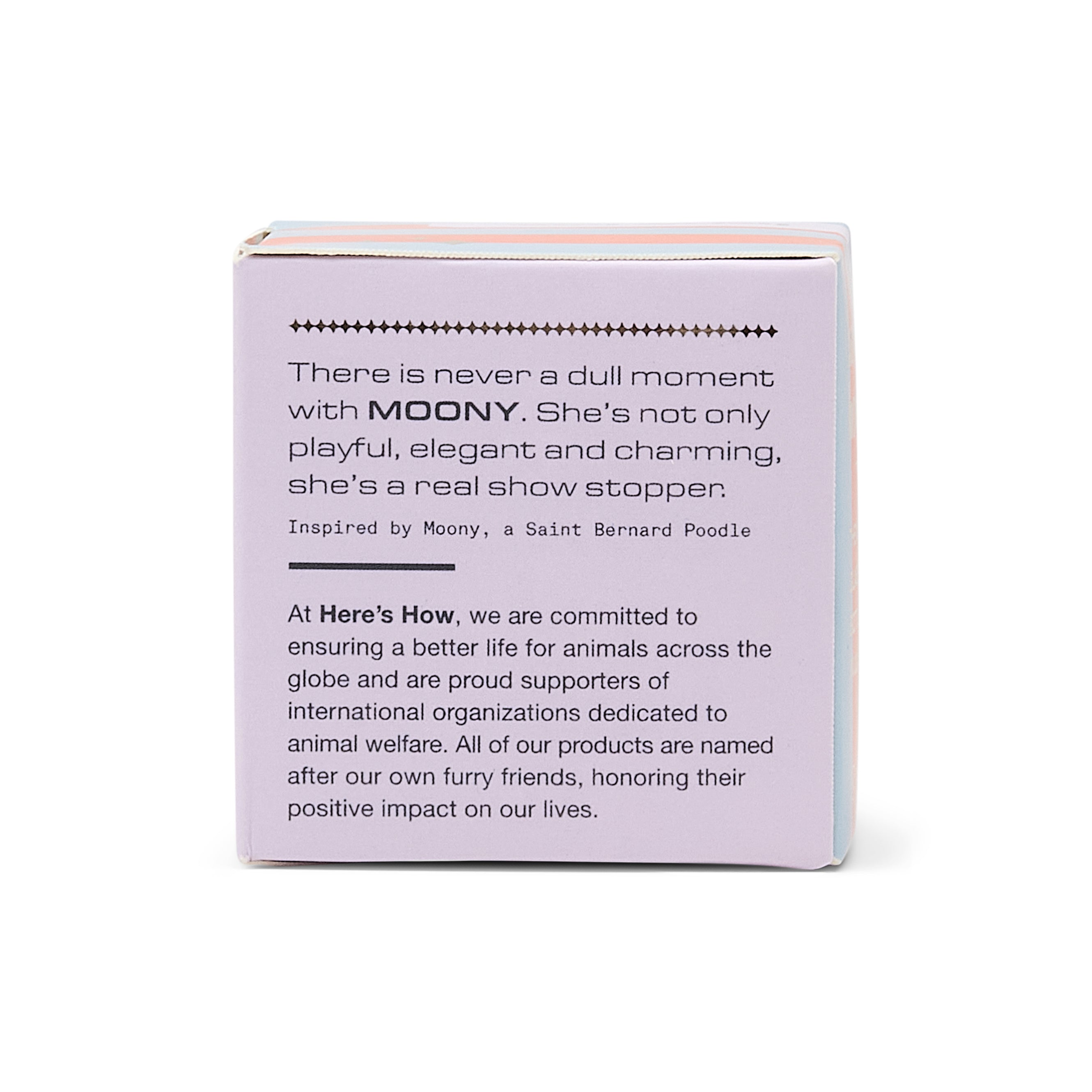 A square product box shown from the back, featuring black printed text on a pale lavender background. The box is photographed on a clean white studio background.