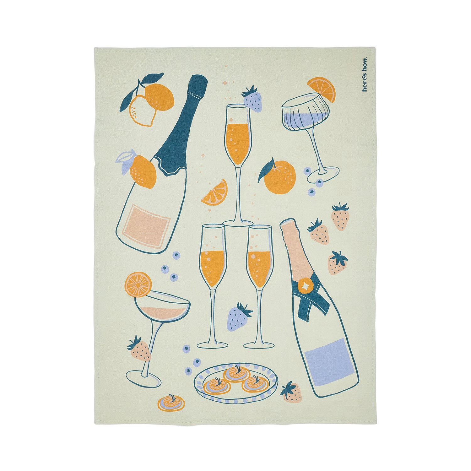 A decorative tea towel featuring a light mint green background with a whimsical illustration of champagne bottles, two champagne glasses, a coupe glass, oranges and strawberries.