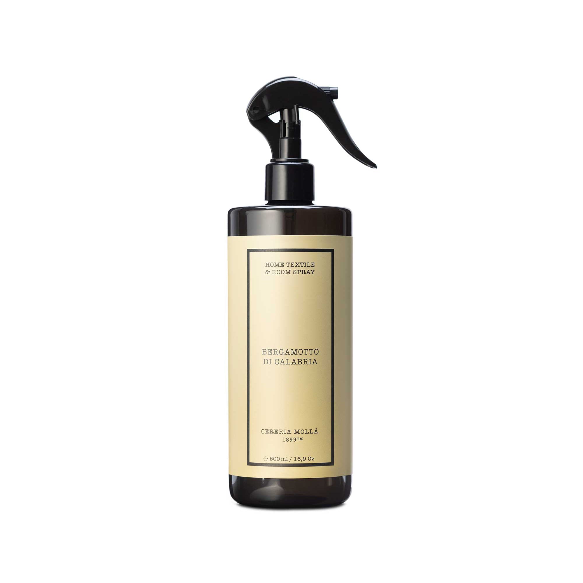 A dark amber glass spray bottle with a black trigger sprayer and a cream-colored label, shown against a plain white background.