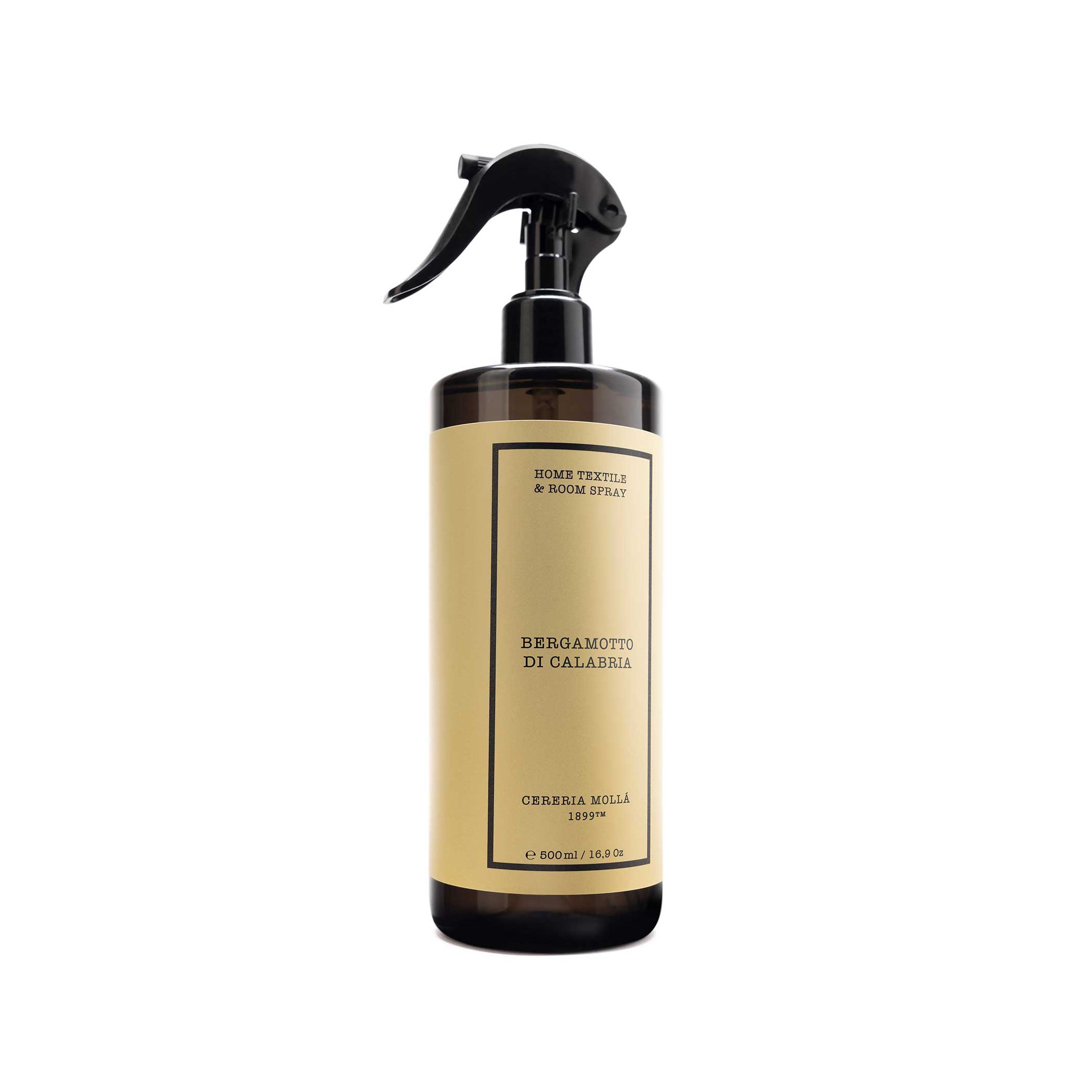 A 600ml amber trigger spray bottle with a black spray head and a beige paper label. The label features elegant black typography reading 'Bergamotto di Calabria'.